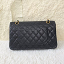 Sac à bandoulière Timeless 11.12 en cuir caviar noir - Chanel