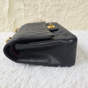 Sac à bandoulière Timeless 11.12 en cuir caviar noir - Chanel