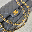 Sac à bandoulière Timeless 11.12 en cuir caviar noir - Chanel