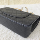 Sac à bandoulière Timeless 11.12 en cuir caviar noir - Chanel