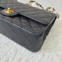 Sac à bandoulière Timeless 11.12 en cuir caviar noir - Chanel