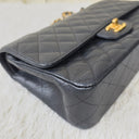 Sac à bandoulière Timeless 11.12 en cuir caviar noir - Chanel