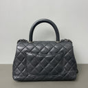 Sac à bandoulière Coco Handle en cuir caviar noir - Chanel