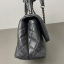 Sac à bandoulière Coco Handle en cuir caviar noir - Chanel