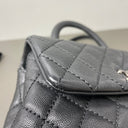 Sac à bandoulière Coco Handle en cuir caviar noir - Chanel