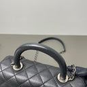 Sac à bandoulière Coco Handle en cuir caviar noir - Chanel
