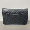 Sac à bandoulière Wallet On Chain en cuir lisse noir - Chanel