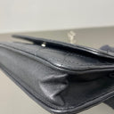 Sac à bandoulière Wallet On Chain en cuir lisse noir - Chanel