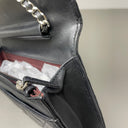 Sac à bandoulière Wallet On Chain en cuir lisse noir - Chanel