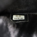 Porte-monnaie en cuir caviar noir - Chanel