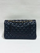 Sac à bandoulière Timeless 25 en cuir lisse noir - Chanel