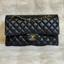 Sac à bandoulière Timeless 25 en cuir lisse noir - Chanel