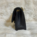 Sac à bandoulière Timeless 25 en cuir lisse noir - Chanel