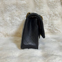 Sac à bandoulière Timeless 25 en cuir lisse noir - Chanel