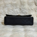 Sac à bandoulière Timeless 25 en cuir lisse noir - Chanel