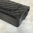 Sac à bandoulière Timeless 25 en cuir lisse noir - Chanel