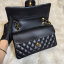 Sac à bandoulière Timeless 25 en cuir lisse noir - Chanel