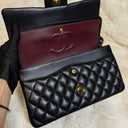 Sac à bandoulière Timeless 25 en cuir lisse noir - Chanel