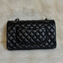 Sac à bandoulière Timeless 25 en cuir lisse noir - Chanel