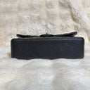 Sac à bandoulière Timeless 25 en cuir lisse noir - Chanel