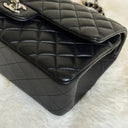 Sac à bandoulière Timeless 25 en cuir lisse noir - Chanel