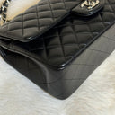 Sac à bandoulière Timeless 25 en cuir lisse noir - Chanel