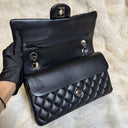 Sac à bandoulière Timeless 25 en cuir lisse noir - Chanel