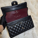 Sac à bandoulière Timeless 25 en cuir lisse noir - Chanel