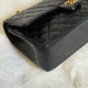 Sac à bandoulière Timeless 25 en cuir caviar noir - Chanel