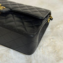 Sac à bandoulière Timeless 25 en cuir caviar noir - Chanel