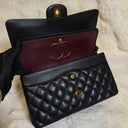 Sac à bandoulière Timeless 25 en cuir caviar noir - Chanel