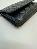 Sac à bandoulière Wallet-On-Chain en cuir lisse noir - Chanel