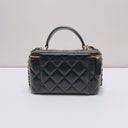 Sac à bandoulière mini Vanity en cuir lisse noir - Chanel