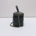 Sac à bandoulière mini Vanity en cuir lisse noir - Chanel