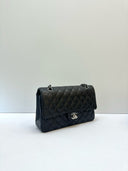Sac à bandoulière Timeless 11.12 en cuir caviar noir - Chanel