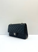 Sac à bandoulière Timeless 11.12 en cuir lisse noir - Chanel