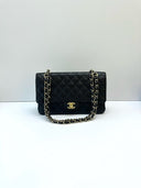 Sac à bandoulière Timeless 11.12 en cuir caviar noir - Chanel