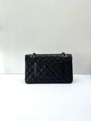 Sac à bandoulière Timeless 11.12 en cuir caviar noir - Chanel