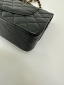 Sac à bandoulière Timeless 11.12 en cuir caviar noir - Chanel