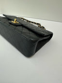 Sac à bandoulière Timeless 11.12 en cuir caviar noir - Chanel