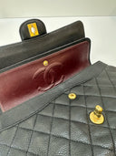 Sac à bandoulière Timeless 11.12 en cuir caviar noir - Chanel