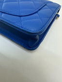Sac à bandoulière Wallet-On-Chain en cuir lisse bleu - Chanel
