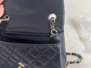 Sac à bandoulière Timeless 20CM en cuir lisse noir et doré - Chanel