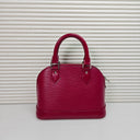 Sac à bandoulière Alma BB en cuir épi framboise - Louis Vuitton