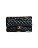 Sac à bandoulière Timeless 25 en cuir lisse noir - Chanel