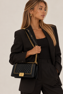 Sac à bandoulière Boy noir en cuir - Chanel