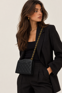 Sac à bandoulière Coco mark matelassé en cuir lisse noir - Chanel