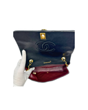 Sac à bandoulière Mademoiselle Médium en cuir lisse noir et doré - Chanel