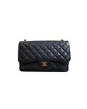 Sac à bandoulière Jumbo en cuir caviar noir - Chanel