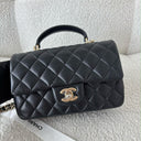 Sac à bandoulière Top Handle en cuir lisse noir - Chanel